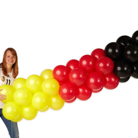 Luftballongirlande in schwarz, gelb rot mit Person, 10m lang